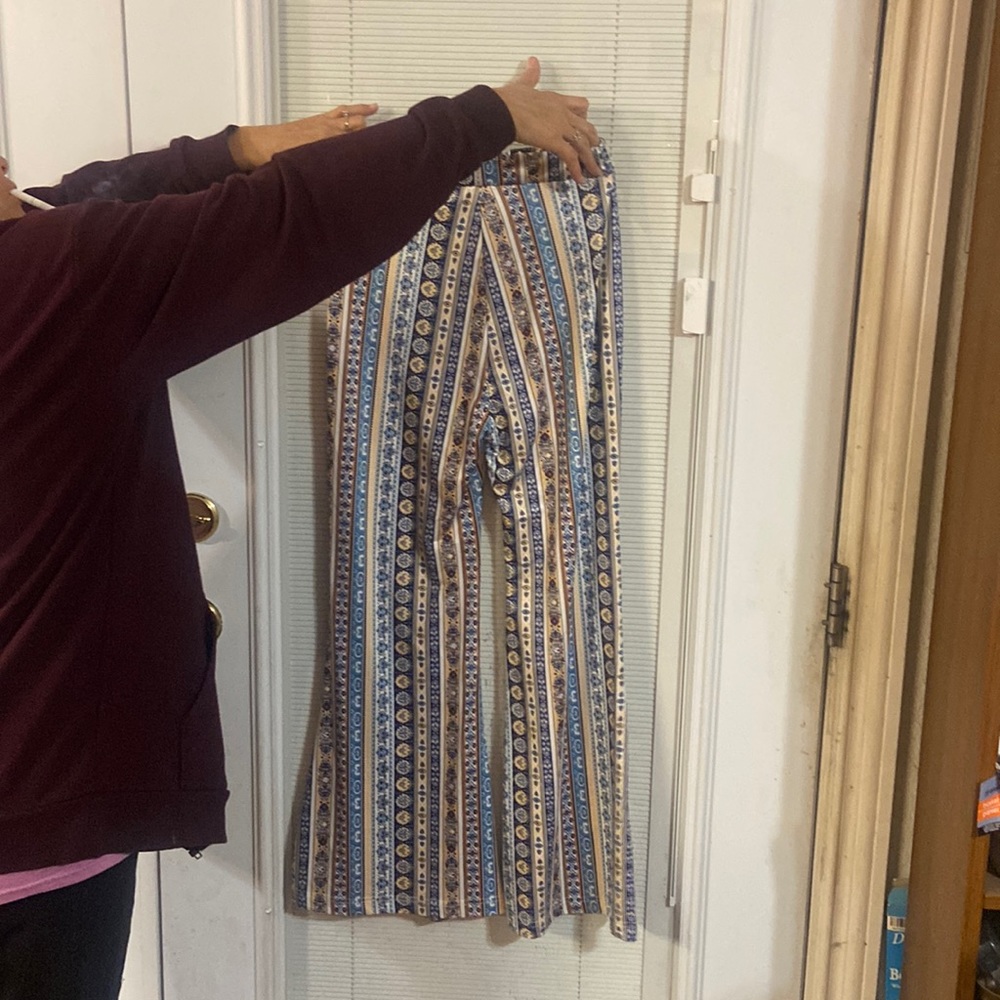 These are a dark blue, light blue ,white, yellow flare pants, good quality.